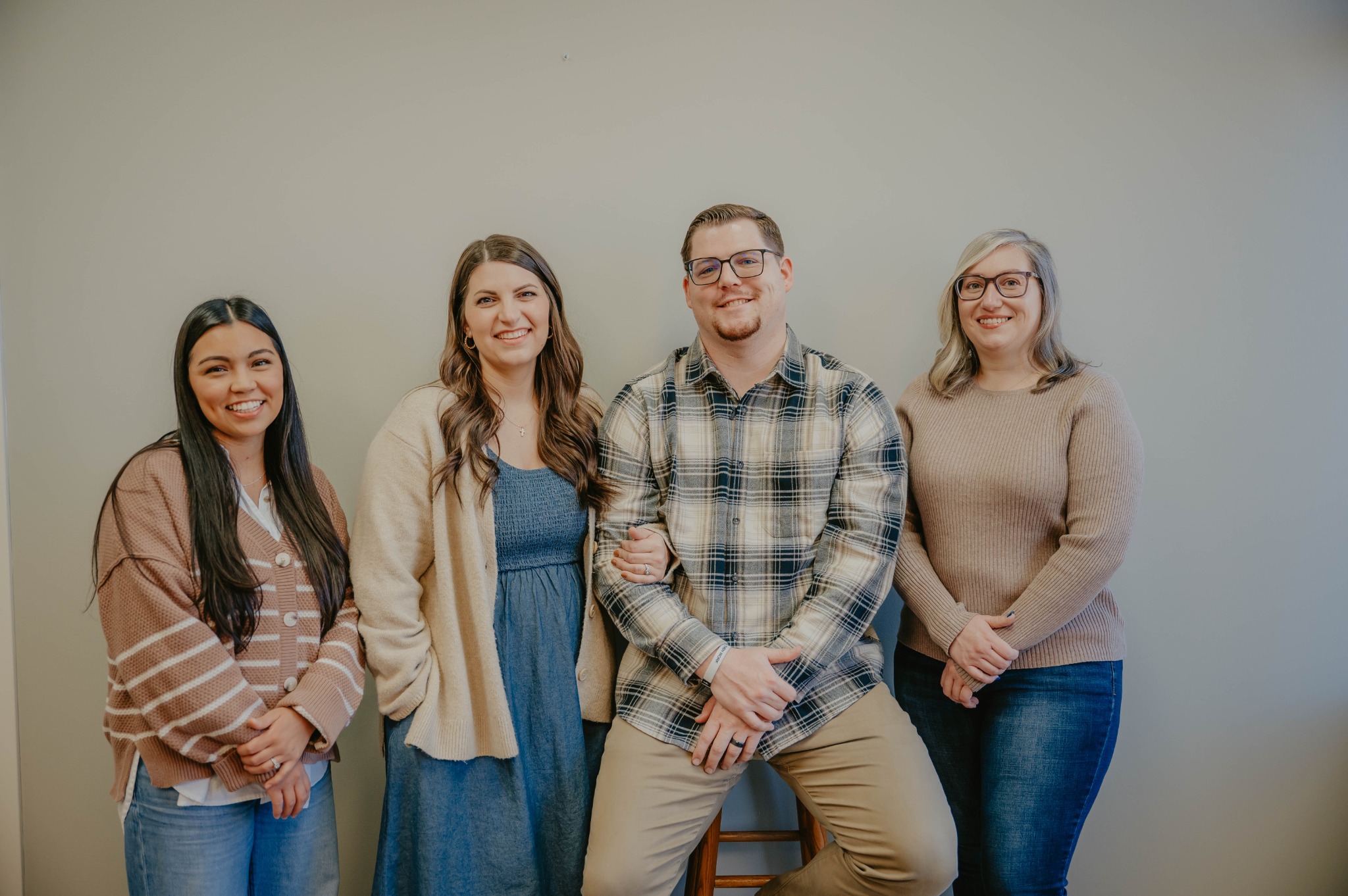 Four members of the Faithful Financials team standing together